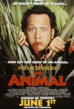 Rob Schneider parting long grass to reveal his face for the movie poster of The Animal